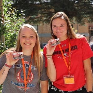 Students pose with gifts from Orientation