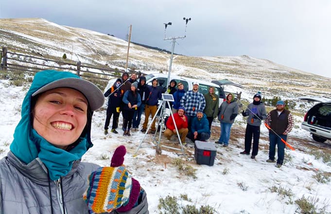 Kori Mooney and University of Montana Western Environmental Science class finish installing a weather station