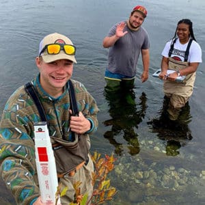 Environmental Science students conduct a baseline assessment of streamflow conditions in the Upper Clark Fork River. Photo courtesy of UMW Environmental Sciences Department. 