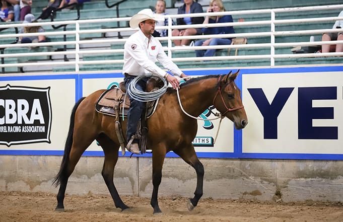 Jacob Christenson competes at the Road to the Horse Collegiate Colt Starting Challenge 